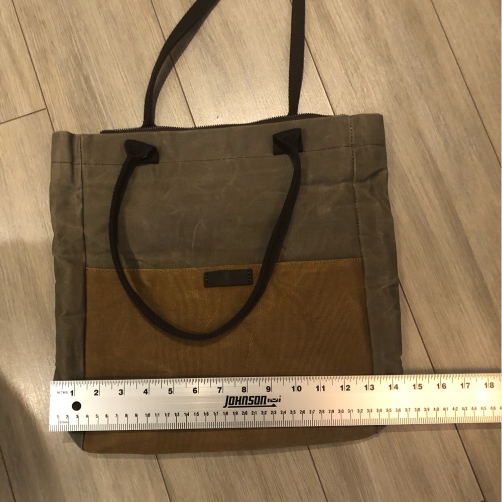 Waxes canvas book/laptop size bag.